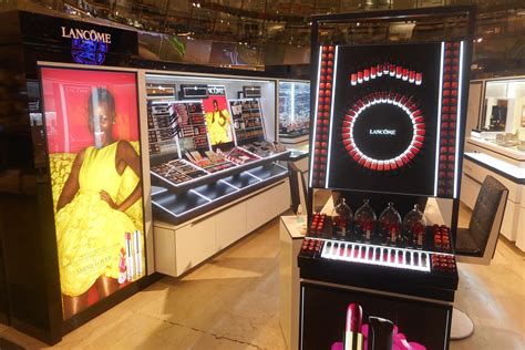 A visually appealing Lancôme point-of-sale (POS) display in a retail setting.
