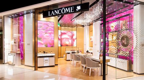 Interior view of a sophisticated Lancôme retail store, emphasizing personalized customer service.