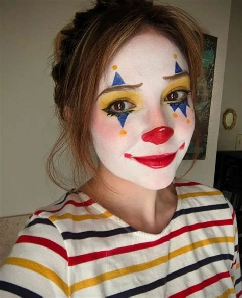 A collage of different clown makeup details: small hearts on the cheeks, a drawn teardrop, exaggerated smile lines, and freckles.