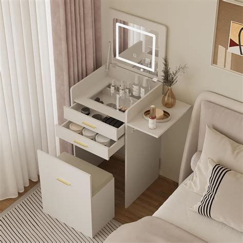 A vanity table with a flip-top mirror and integrated storage.