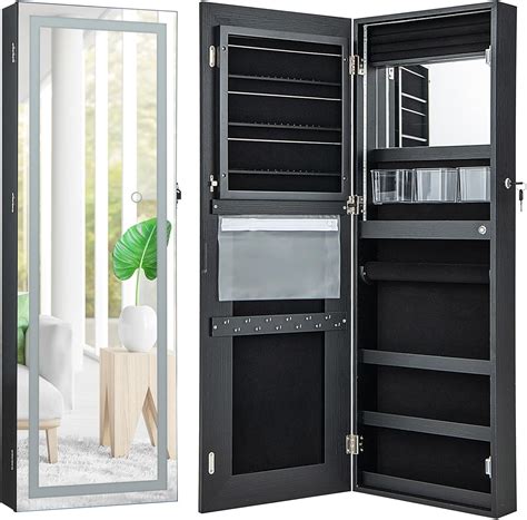 A large jewelry cabinet with a mirrored front and interior lighting.