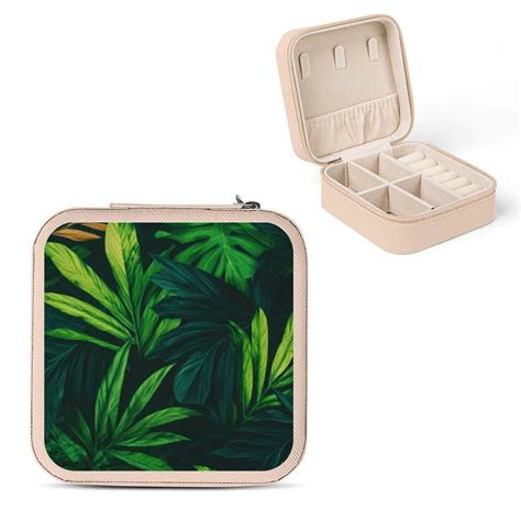 A compact travel jewelry case with multiple compartments.