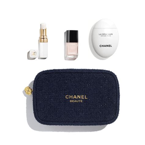 Chanel Coveted Essentials Beauty Set, showcasing nail polish, hand cream, and lip balm
