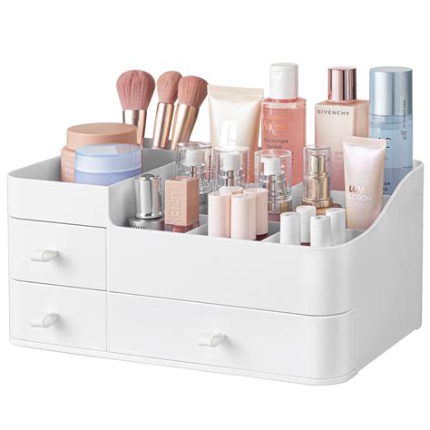 The Yamazaki Home Tower Large Makeup Organizer with its compartments filled with various makeup items.