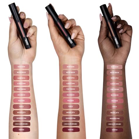 Swatches of the Makeup By Mario Ultra Suede Cozy Lip Creme in various shades, including Vampish and Mocha Latte.