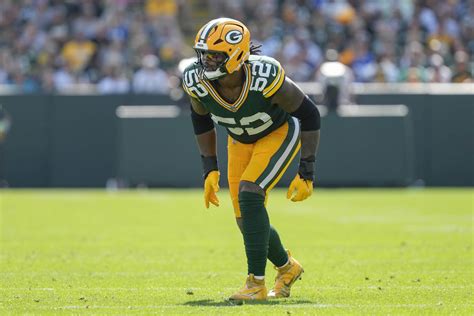 Rashan Gary celebrating a sack with the Green Bay Packers.