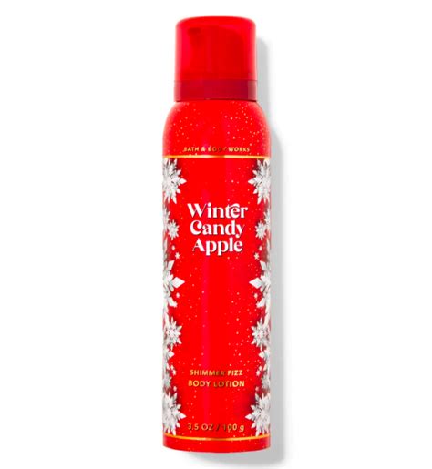 A bottle of Bath & Body Works Winter Candy Apple Shimmer Fizz Body Lotion, showcasing its festive packaging and shimmering texture.