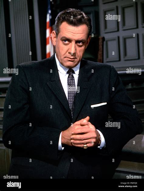 Raymond Burr as Perry Mason in a dramatic courtroom scene.