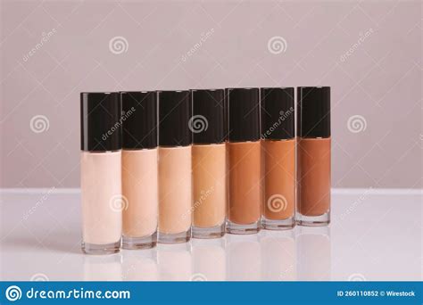 A collage of the recommended foundation bottles and their textures.