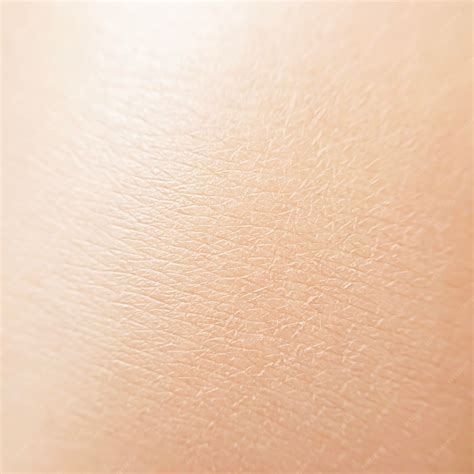 Close-up image of healthy skin texture with minimized pore appearance.