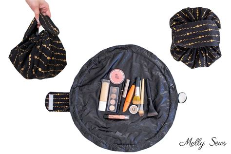 Illustration showing the Lay-n-Go bag opening flat to reveal cosmetics and then closing with a drawstring.