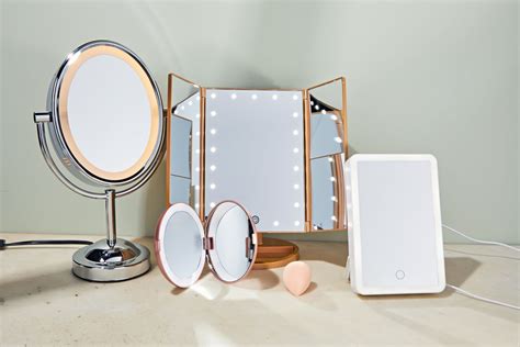 A selection of various lighted makeup mirrors showcasing different designs and features