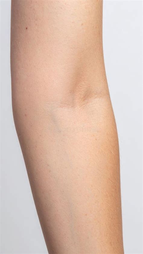 Illustration showing how to check skin tone on the inner forearm.