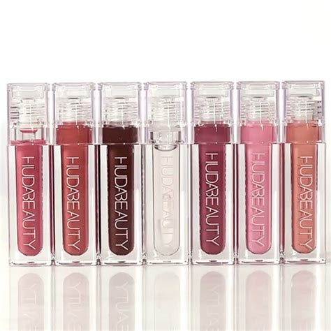 Close-up shot of lips with Huda Beauty Clear Lip Gloss, showcasing high shine and full appearance