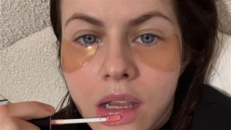 Alexandra Daddario applying Vintner's Daughter serum