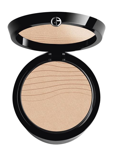 Close-up of a luminous pressed powder compact with a soft glow effect.