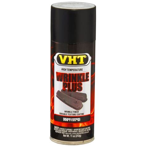 Close-up of a metal surface undergoing the VHT Wrinkle Plus heat gun application, showing texture formation