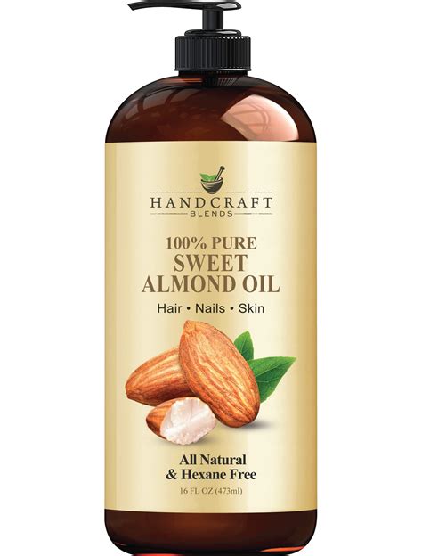 Close-up photograph of sweet almond oil being applied to skin.