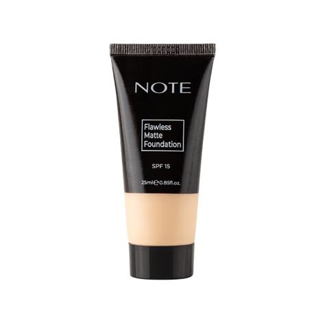 A close-up shot of a woman's face with a flawless matte foundation applied, ready for faux freckle application.