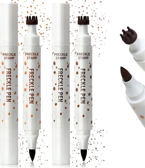 A flat lay of various makeup products suitable for creating faux freckles: eyebrow pencils, liquid eyeliner, and a dedicated freckle pen.