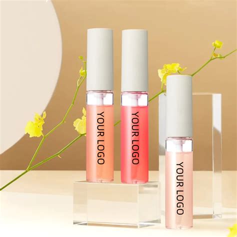 A diverse range of vegan lip gloss products in various shades and packaging.