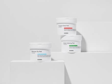 Illustrative graphic showcasing the COSRX brand's journey and award recognitions.