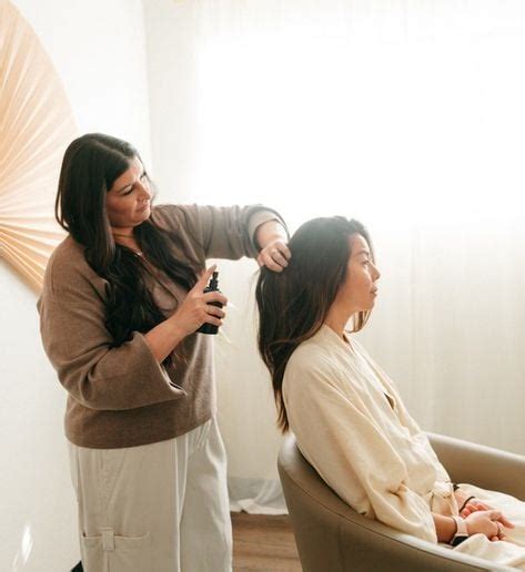 A salon offering a head spa service with a client looking relaxed.