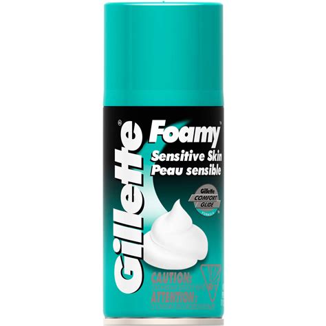 A close-up shot of Gillette Foamy Sensitive Skin Shaving Cream lather on a hand, emphasizing its creamy texture.