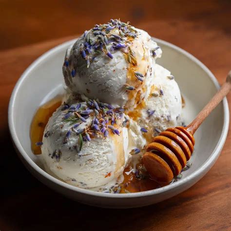 A serene scoop of lavender honey ice cream garnished with edible flowers