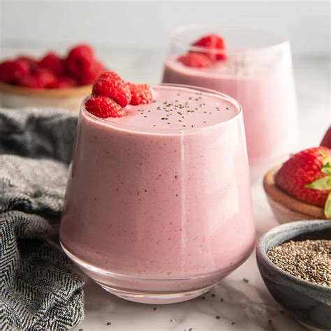 Illustration of various healthy ingredients that can be added to smoothies, such as spinach, berries, chia seeds, and protein powder.