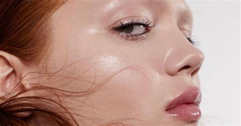 Close-up of a person's face with a dewy, 