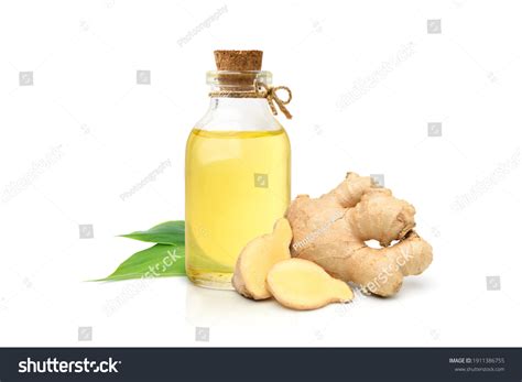 Aesthetic photo of ginger essential oil bottles with fresh ginger root.