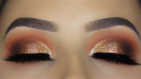 Close-up of an eye with a copper smokey eye makeup application