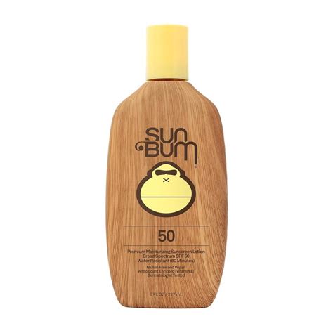 Kayla Walden applying Sun Bum sunscreen to her arm