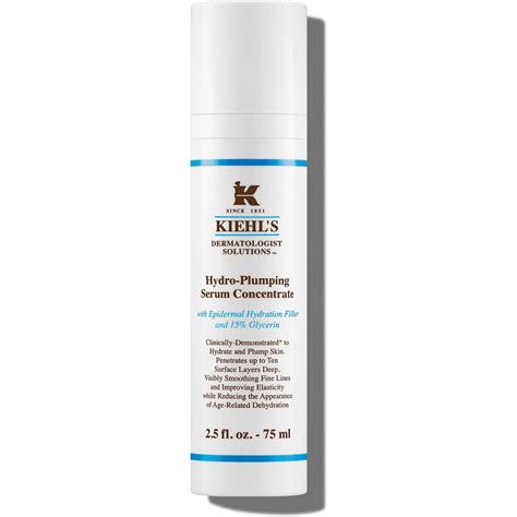 Aesthetic shot of a bottle of Kiehl's Hydro-Plumping Serum Concentrate next to fresh water droplets on a clean surface.