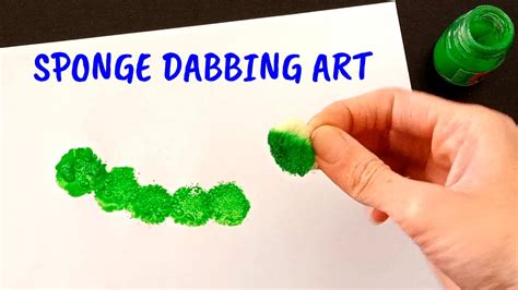 A close-up demonstrating the dabbing motion used with a silicone sponge for foundation application.
