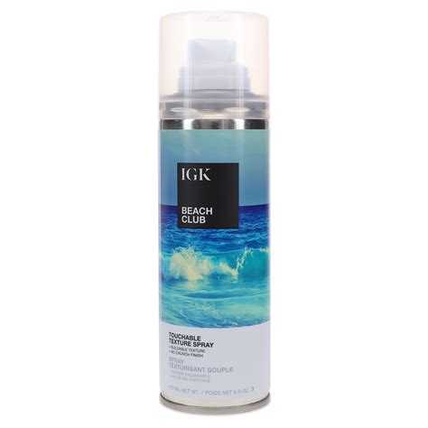 IGK Beach Club Texture Spray bottle and tousled wavy hair