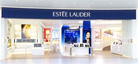 Estee Lauder consultant performing a half-face demonstration