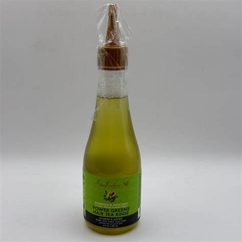 Close-up of the SheaMoisture Power Greens Hair Tea Rinse bottle applicator