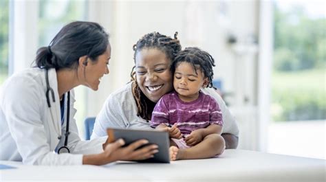 Image of a parent talking to a pediatrician about their baby's rash.