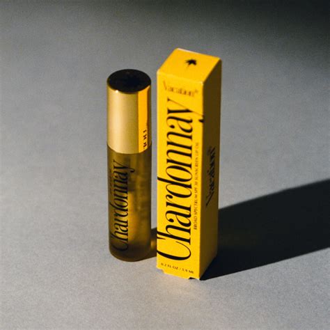 Close-up of Vacation® Chardonnay Lip Oil on lips.