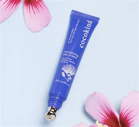 Image showcasing the Cocokind Revitalizing Eye Cream with its metal applicator tip
