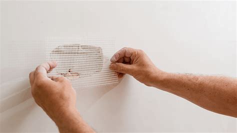 Illustration showing the proper method for taping drywall joints with fiberglass mesh tape.