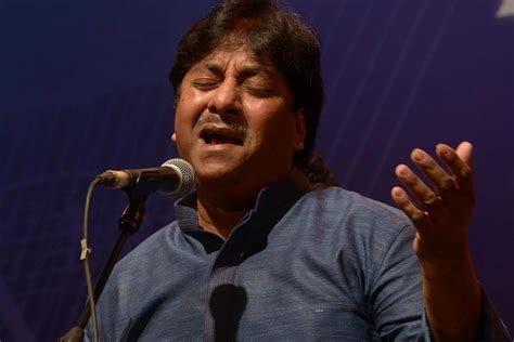 Portrait of a young Ustad Rashid Khan with a swarmandal