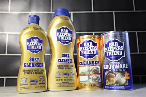 A sparkling clean shower door after being treated with Bar Keepers Friend