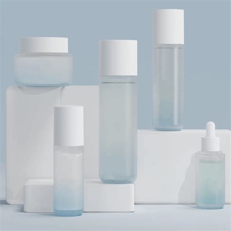 Close-up of various empty cosmetic jars and bottles for skincare and makeup