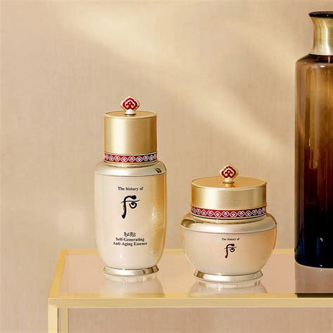 Elegant product arrangement of The History of Whoo Bichup Self-Generating Anti-Aging Essence and Cheongidan Radiant Rejuvenating Cream, evoking a sense of royalty.