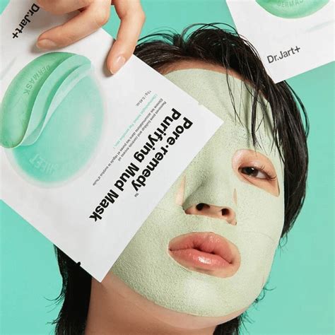 Demonstration of applying the Dr. Jart+ Pore Remedy Purifying Mud Face Mask.