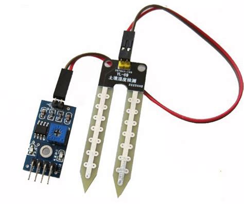Diagram illustrating a resistive soil moisture sensor measuring soil moisture.