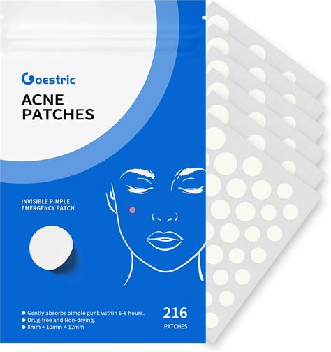 A close-up of a person applying a clear spot treatment patch to a pimple.